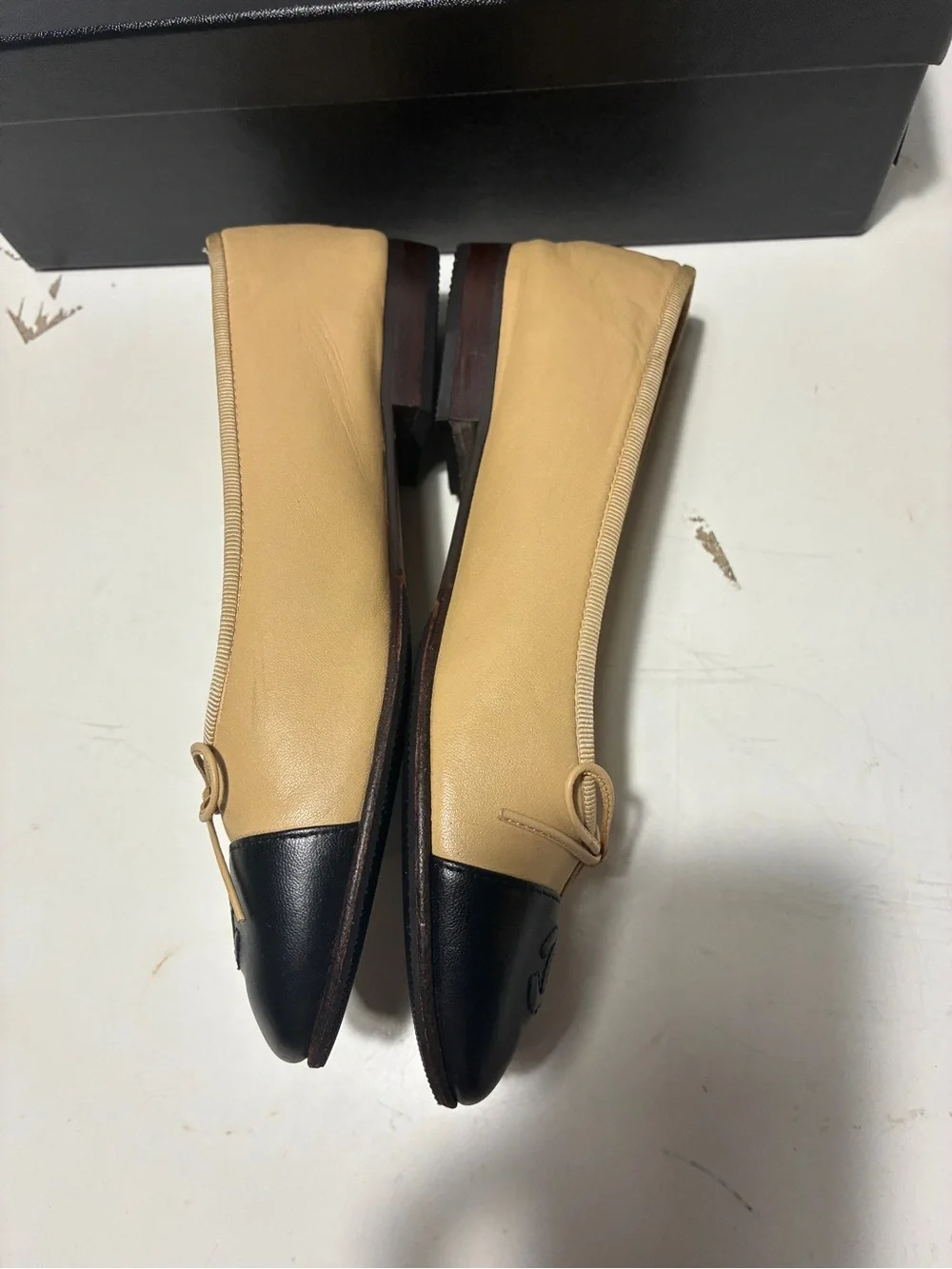 CHANEL Beige Leather Ballet Flats with Black Cap Toe